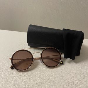 BCBG round metal sunglasses with case and cleaning cloth.